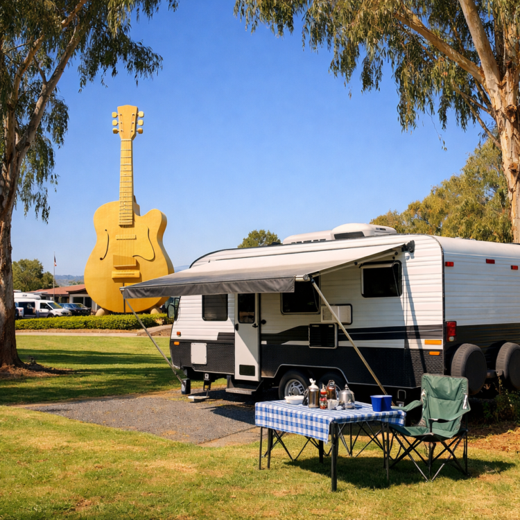 Caravan at Tamworth holiday park with Big Golden Guitar in background