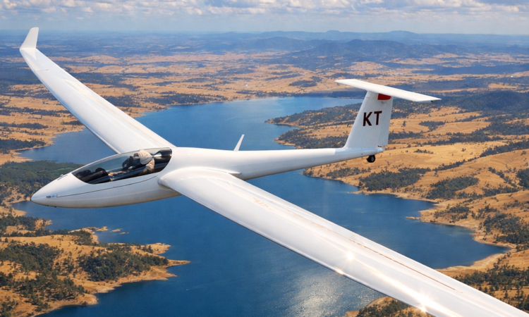 Glider soaring above Lake Keepit near Tamworth with reservoir and farmland below